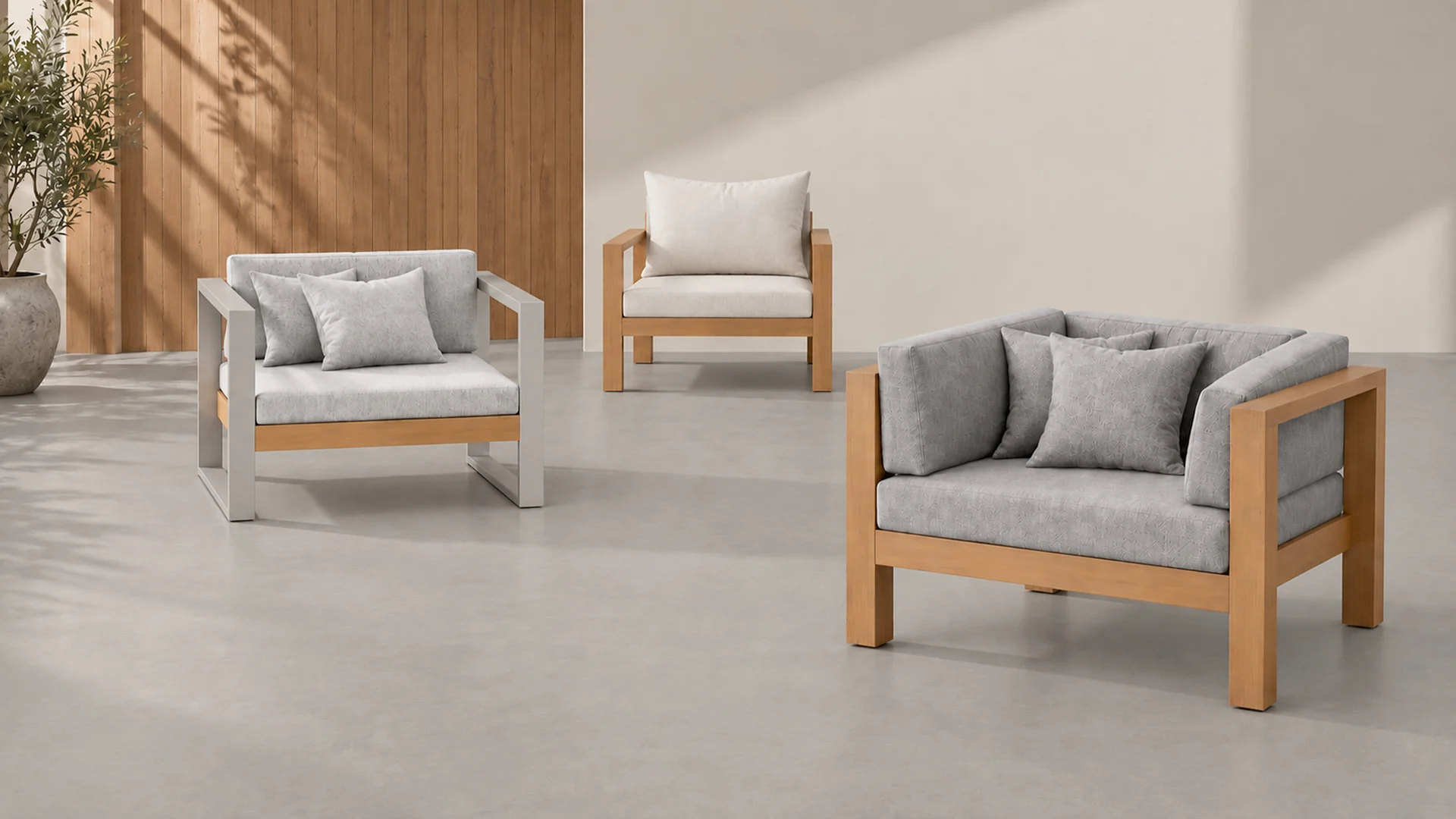 Poltronas de exterior en madera con cojines grises